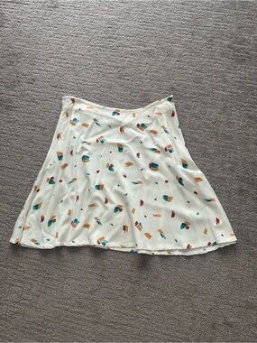 O'Neill Cream Skater Skirt with Teal Mustard and Rust Brushstroke Print